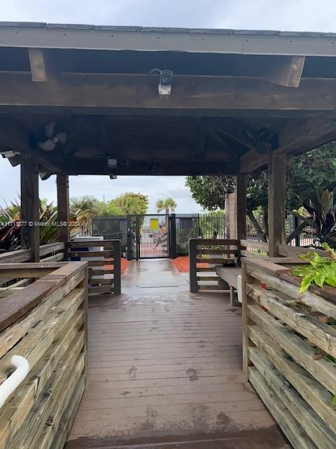 exterior space featuring a gazebo and a wooden deck