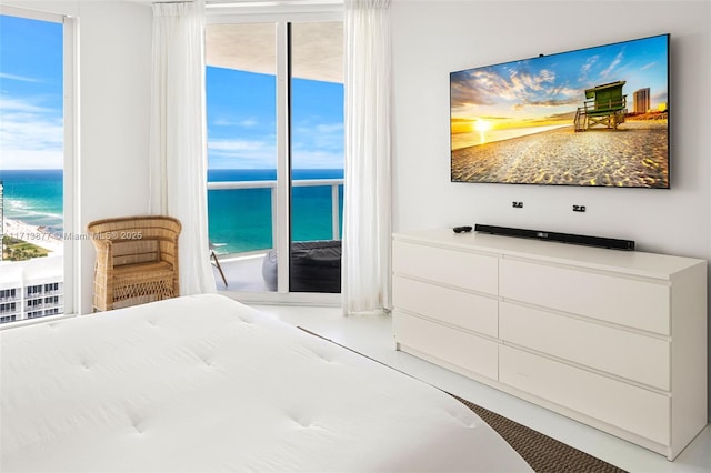 4779 Collins Ave Unit 3108, Miami Beach, FL 33140 - bedroom with a water view, multiple windows, and expansive windows