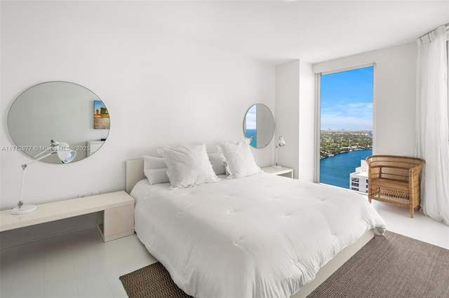 4779 Collins Ave Unit 3108, Miami Beach, FL 33140 - bedroom with access to outside and a water view