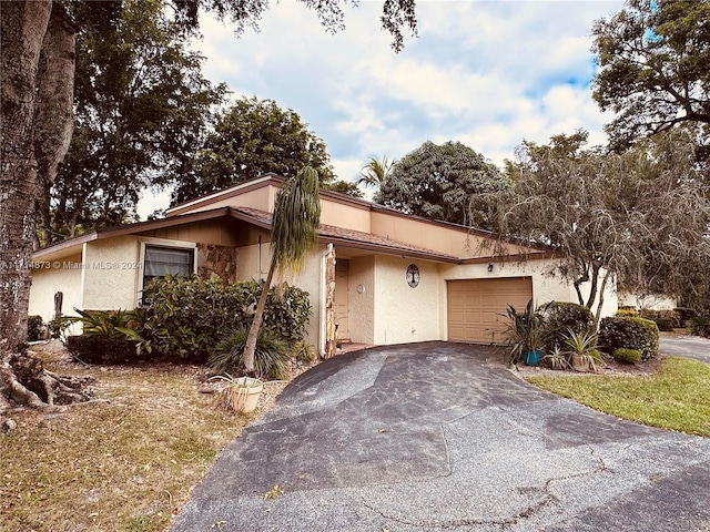 ranch-style home with a garage