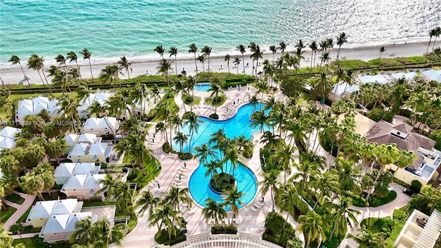 aerial view featuring a water view and a beach view