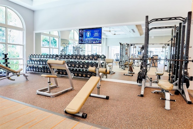 exercise room with ceiling fan