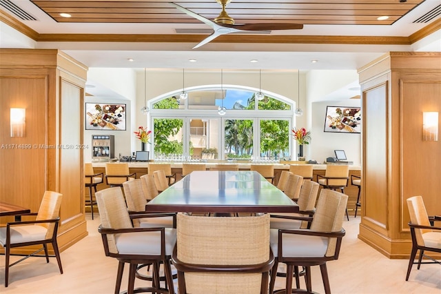 dining room featuring ceiling fan and ornamental molding