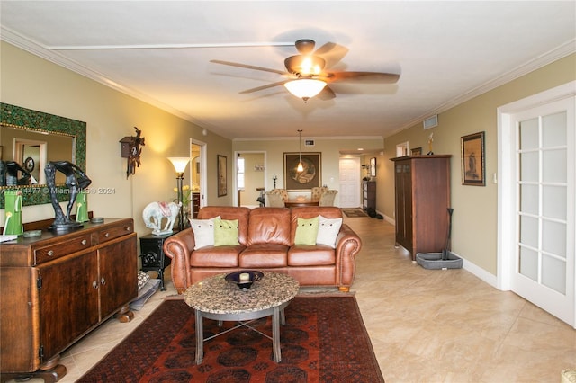 living room featuring ceiling fan and ornamental molding