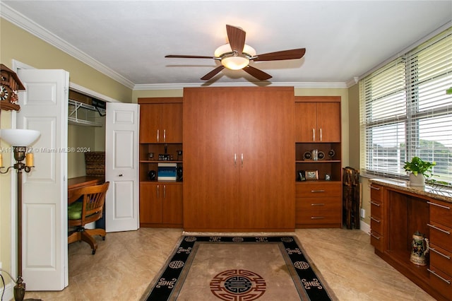 kitchen featuring ceiling fan and crown molding