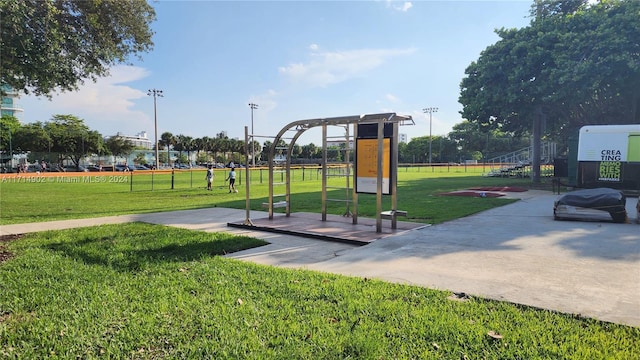 view of play area featuring a lawn