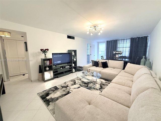 250 174th St Unit 2307, Sunny Isles Beach, FL 33160 - living room with light tile patterned floors and a chandelier