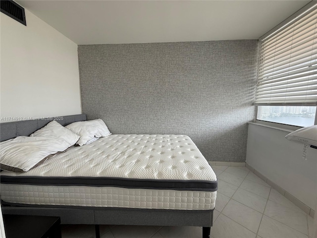 250 174th St Unit 2307, Sunny Isles Beach, FL 33160 - bedroom featuring light tile patterned flooring
