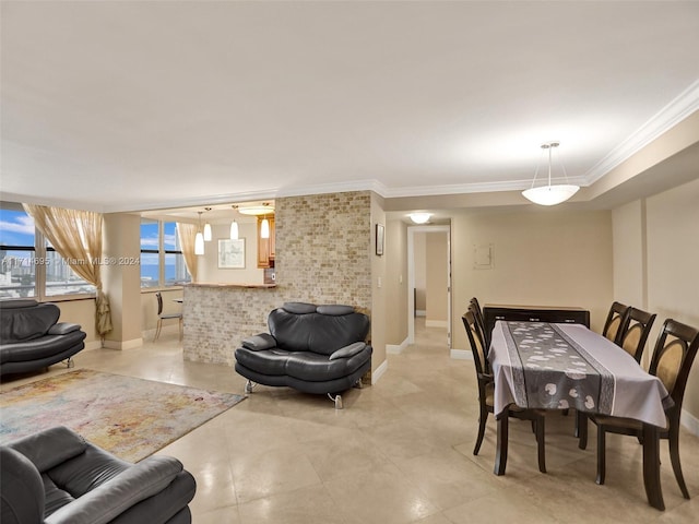 dining room featuring ornamental molding