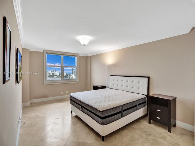 bedroom with crown molding