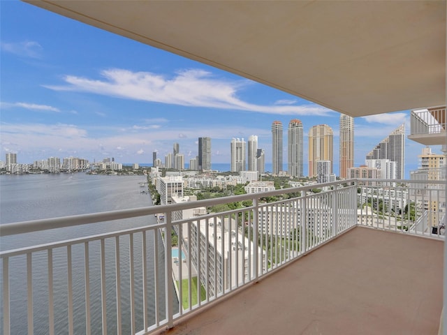 balcony featuring a water view