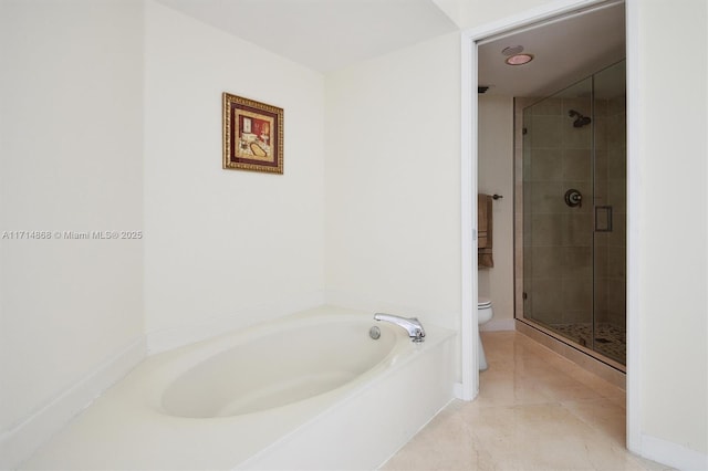 bathroom with shower with separate bathtub, tile patterned floors, and toilet