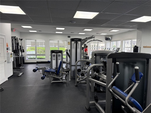 gym featuring a drop ceiling