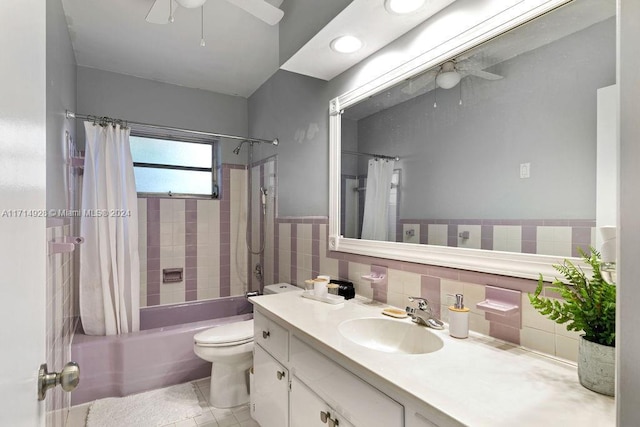 full bathroom with ceiling fan, shower / bath combo, tile patterned floors, toilet, and vanity