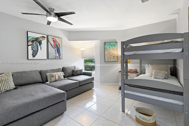 bedroom featuring ceiling fan and light tile patterned flooring