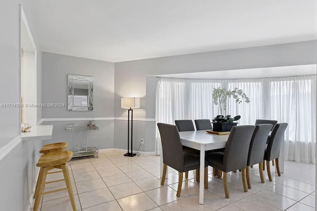 dining room with light tile patterned floors