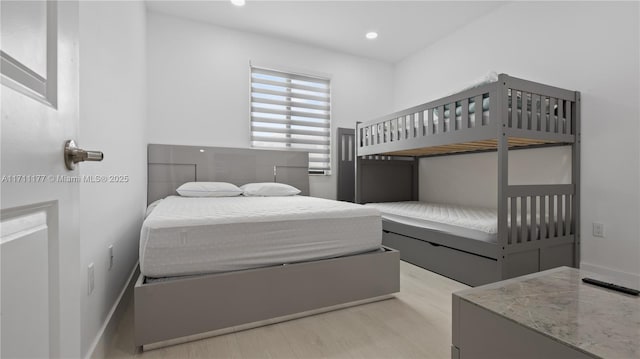 bedroom with light wood-type flooring