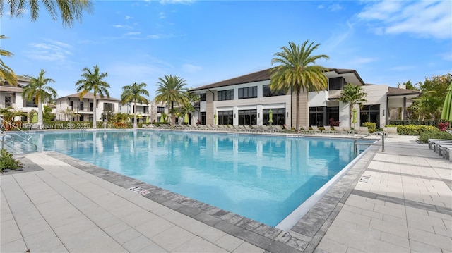 view of pool featuring a patio area