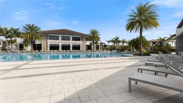 view of pool featuring a patio