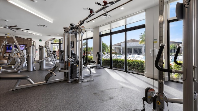 gym with floor to ceiling windows