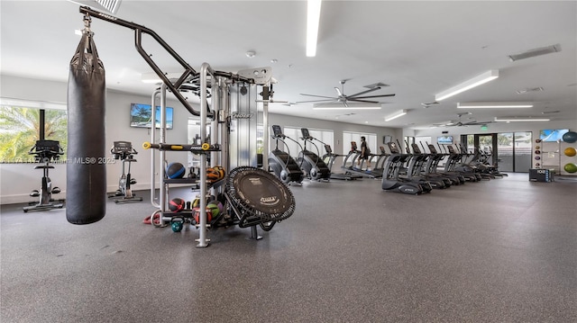 workout area with ceiling fan