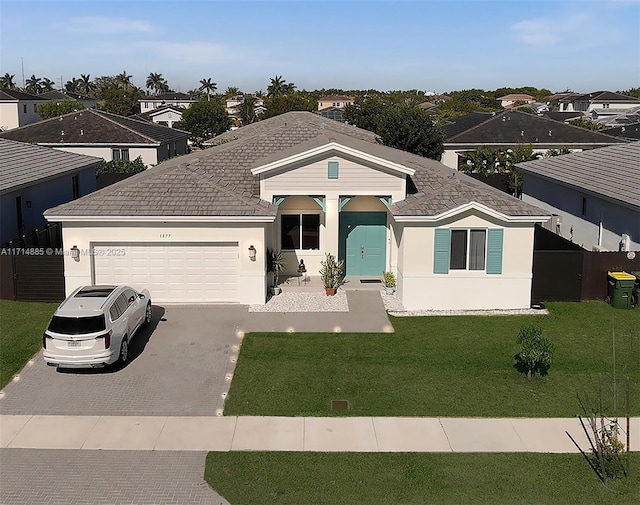 1877 NE 1st St, Homestead, FL 33033 - ranch-style home featuring driveway, a residential view, an attached garage, stucco siding, and a front lawn