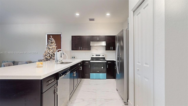 kitchen with dark brown cabinets, stainless steel appliances, and sink