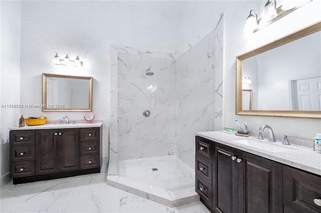 bathroom featuring a shower and vanity