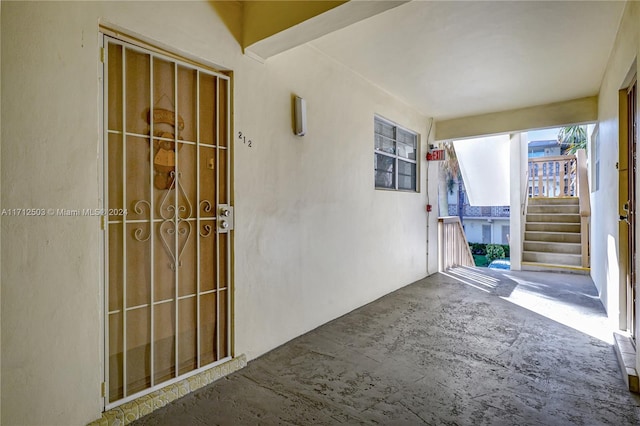 16750 NE 14th Ave Unit 212, Miami, FL 33162 - view of patio / terrace featuring stairs