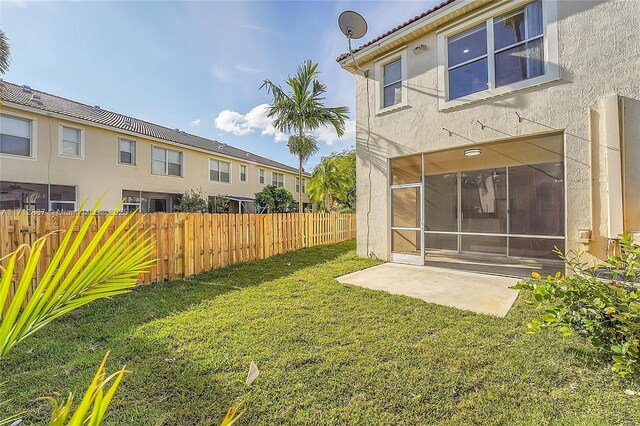 view of yard featuring central AC unit and a patio area