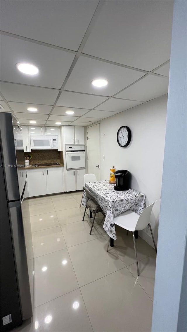 view of tiled dining space