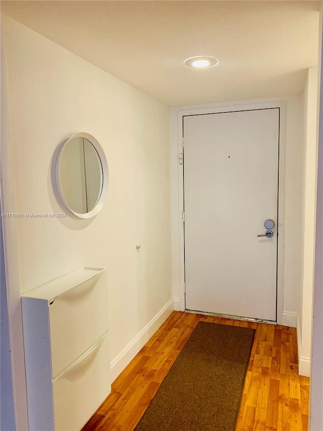 doorway to outside with light hardwood / wood-style floors