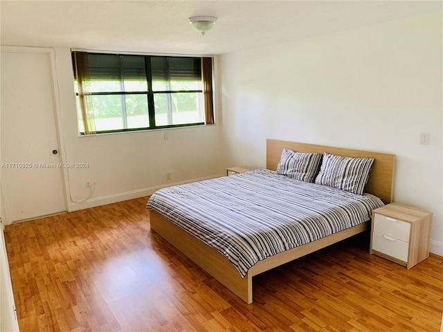 bedroom featuring hardwood / wood-style floors