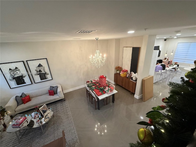 living room with a notable chandelier