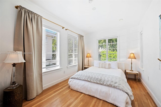 bedroom featuring light hardwood / wood-style flooring