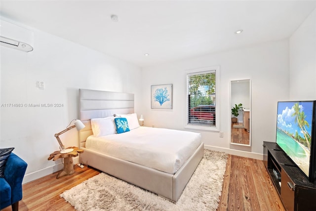 bedroom with light wood-type flooring