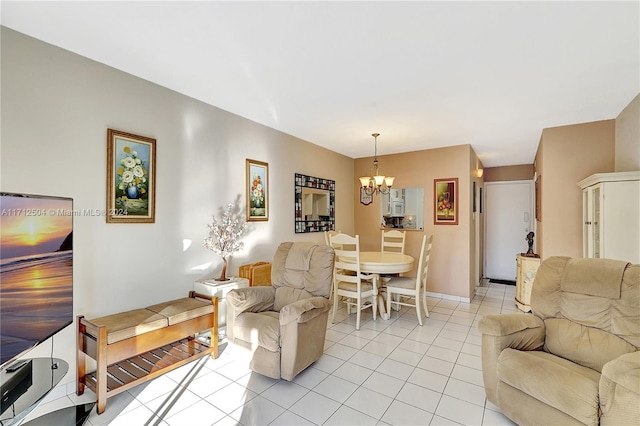 living room featuring light tile patterned floors and a chandelier