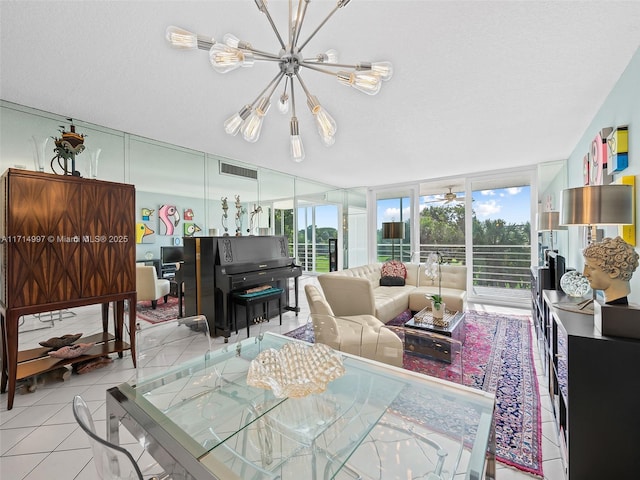 interior space with light tile patterned flooring, a wall of windows, a textured ceiling, and an inviting chandelier