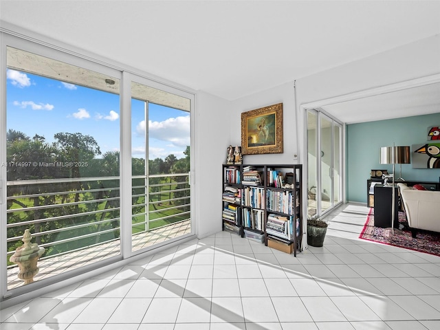 interior space featuring tile patterned floors and floor to ceiling windows