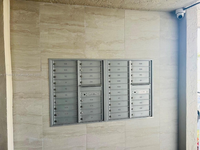 exterior details featuring mail area