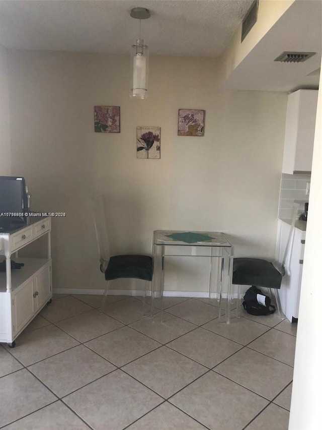 2000 Towerside Ter Unit 905, Miami, FL 33138 - dining area featuring light tile patterned flooring