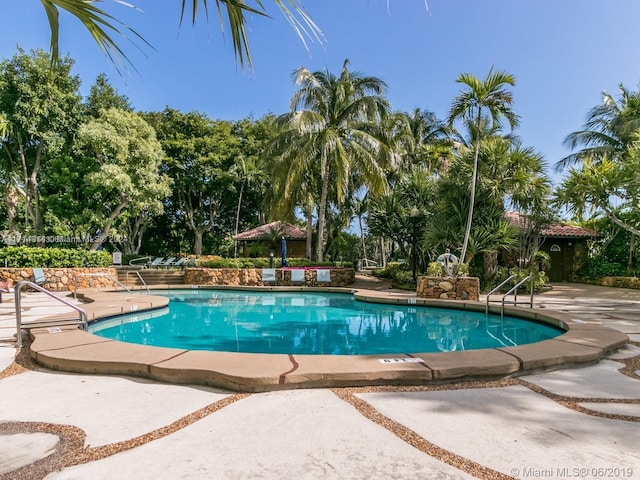 2000 Towerside Ter Unit 905, Miami, FL 33138 - community pool with a patio