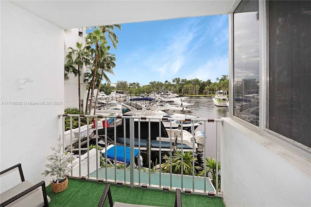 balcony featuring a water view