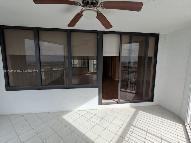 view of patio / terrace featuring ceiling fan