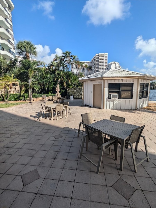 view of patio featuring an outdoor fireplace