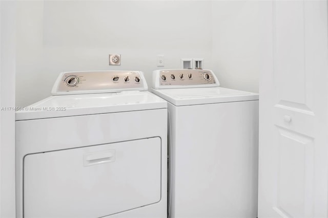 washroom featuring separate washer and dryer