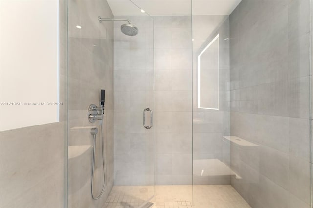 bathroom with an enclosed shower