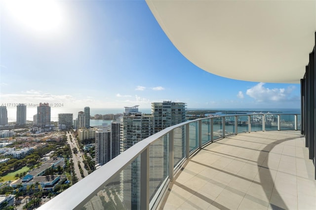 balcony featuring a water view