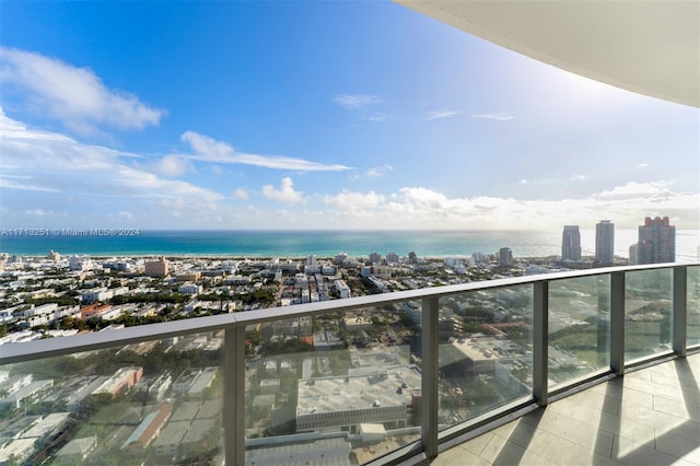 balcony featuring a water view