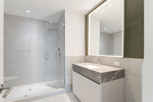 bathroom featuring vanity and walk in shower